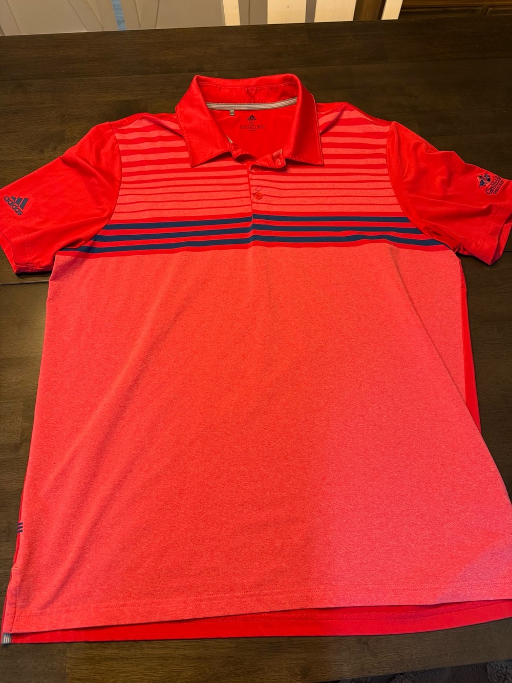 adidas Men’s pink Polo with blue Stripe Accents